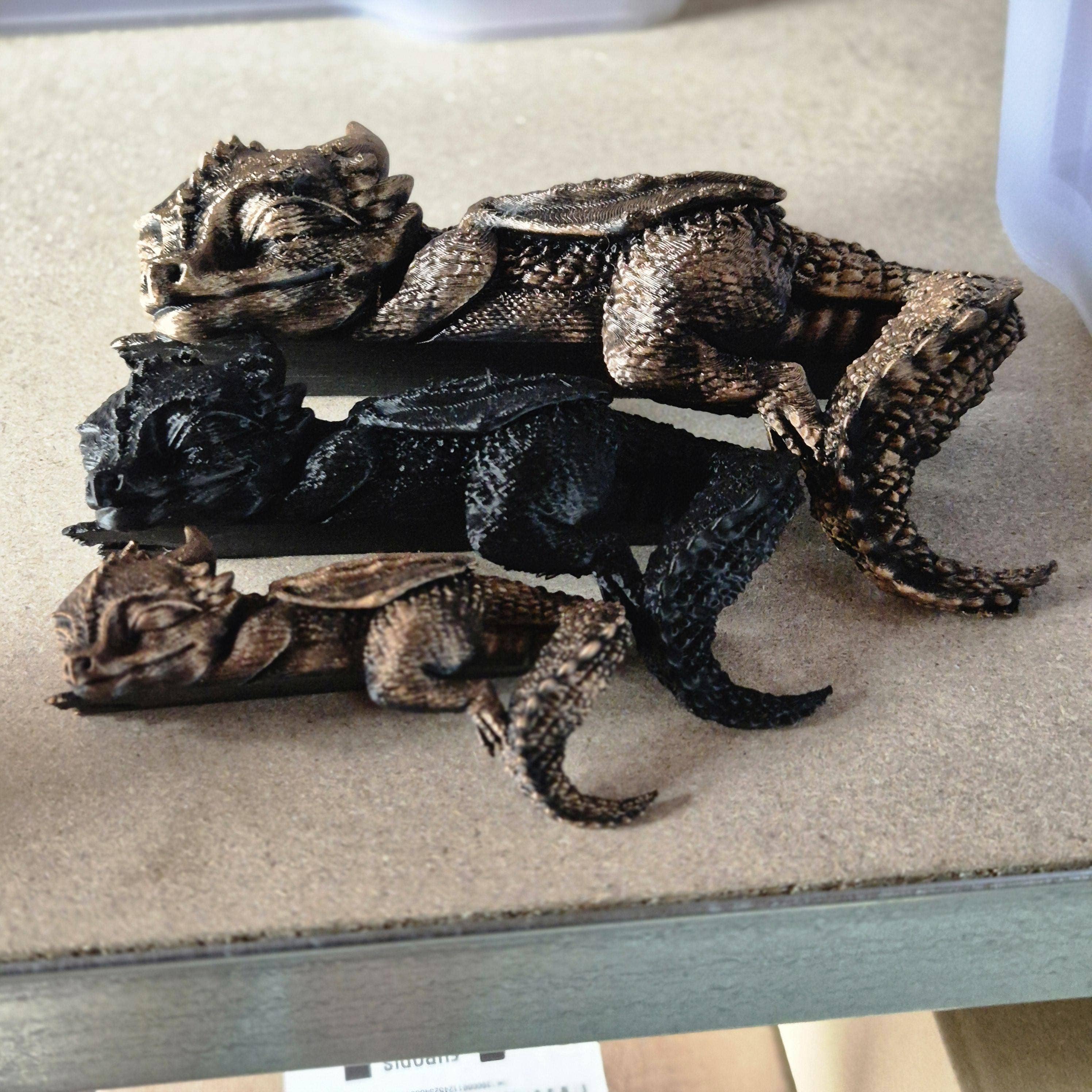 Sovende Andarna dragefigur – Empyrean-serien